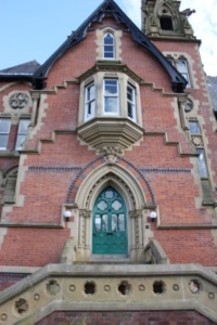 green door main building entrance reception stock