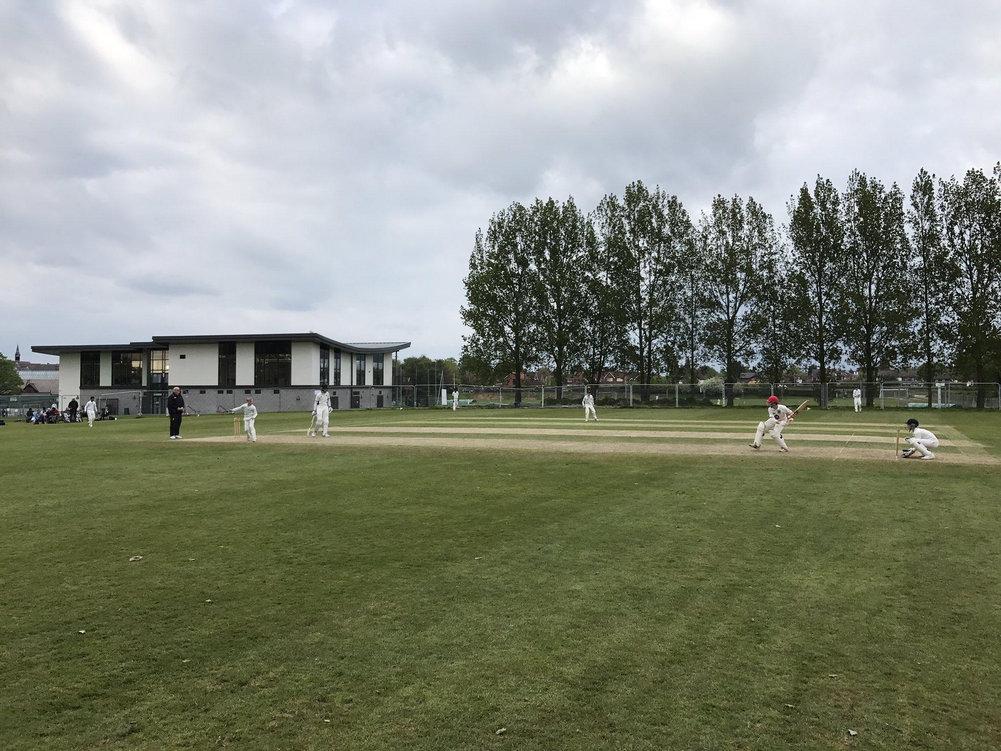 cheadle hulme school's U15 cricketers play a match against Cheshire County U14s on the School field in front of the new pavilion