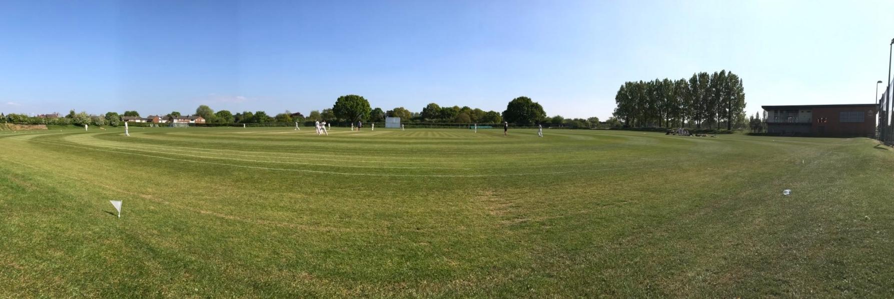 U18s cricketers at cheadle hulme school play on the field against Newcastle Under Lyme