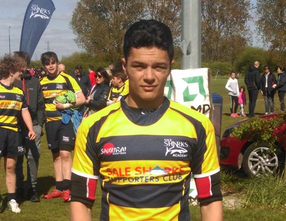 cheadle hulme school student Noah wears his yellow and black Sale Sharks kit on the rugby field after being selected for the North of England Rugby Player Development programme