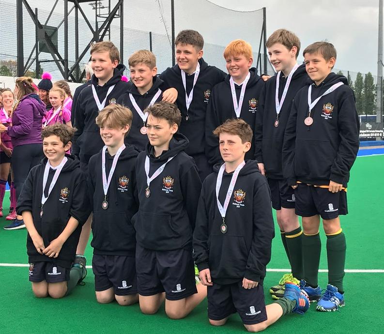 cheadle hulme schools U13s senior boys hockey team pose for the camera in their kits after taking 4th place at the National Schools In2Hockey finals 