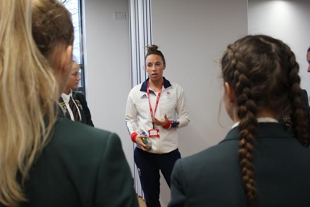 Team GB England Hockey player and Olympic gold medallist Susannah Townsend talks with Cheadle hulme school sports players and girls hockey team at the launch of the School's news sports pavilion