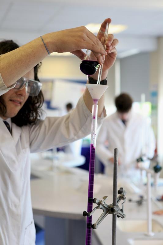 CHS Biologist Louis cheadle hulme school student louis conducts an experiement in the school lab after being awarded an honorable mention by the european society for human genetics in their school DNA essay writing competition