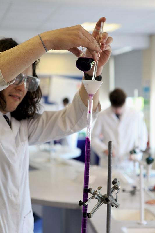 cheadle hulme school student louis conducts an experiement in the school lab after being awarded an honorable mention by the european society for human genetics in their school DNA essay writing competition 