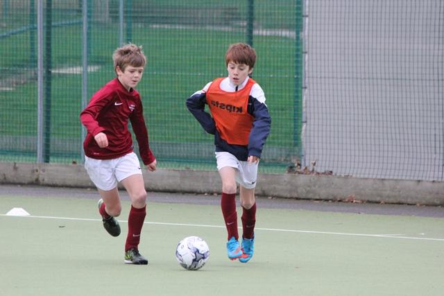 footballers play in a tournament at cheadle hulme school