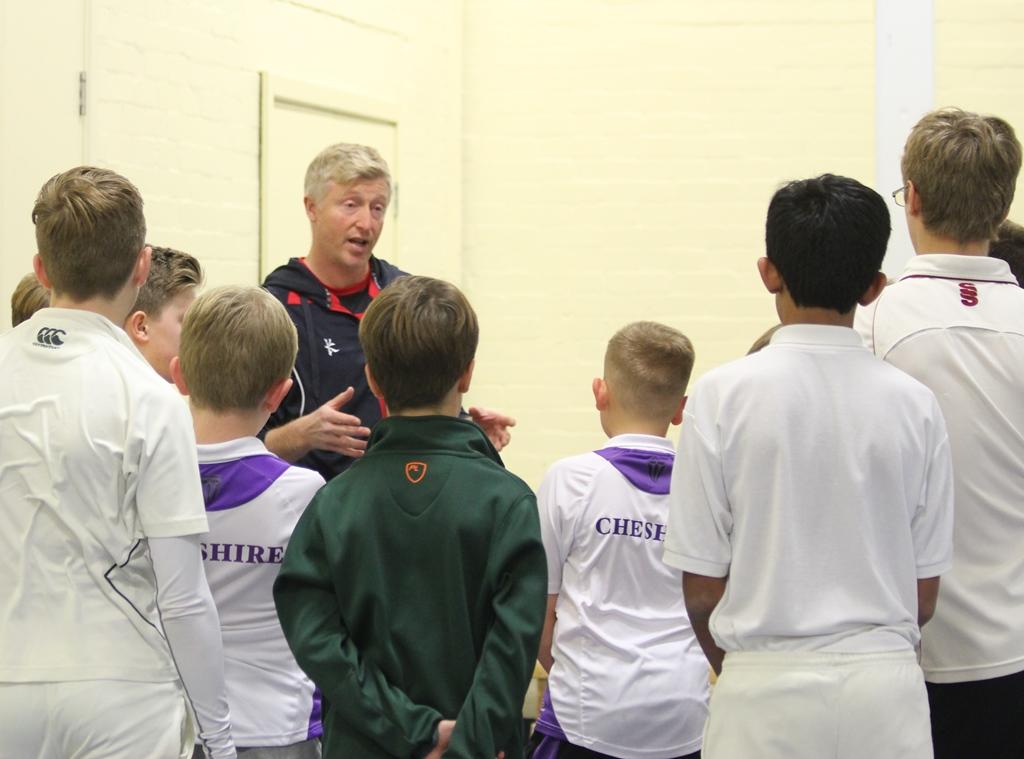 Lancashire cricket player and county captain glen chapple talks to young cricketer students at cheadle hulme school about leadership and team work skills in cricket during a masterclass