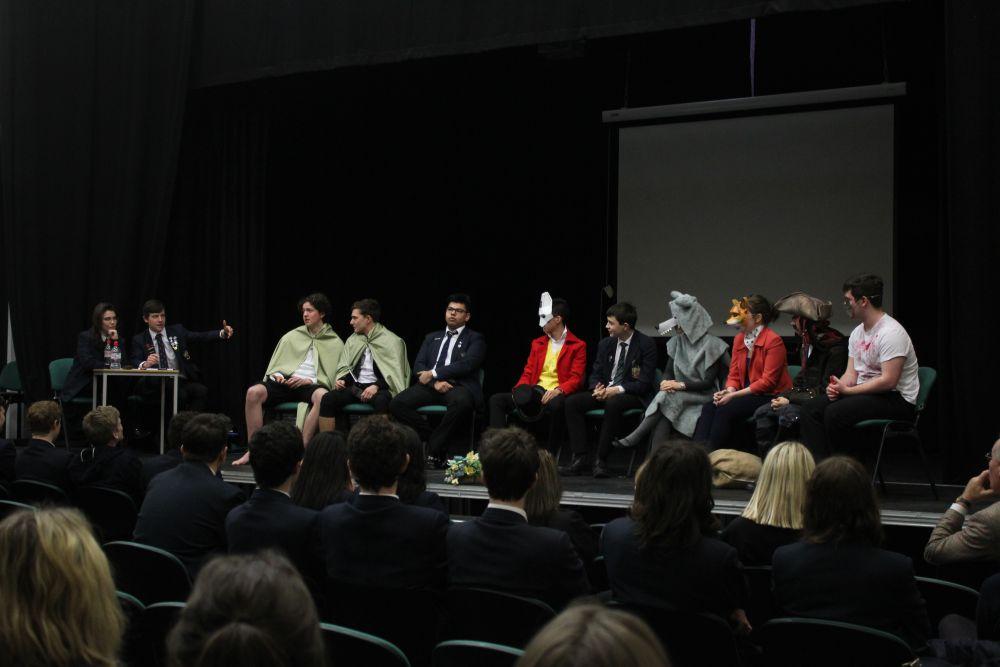students un cheadle hulme school's sixth form perform as their favourite literary characters in the school's literary world book day balloon debate to win votes from the audience