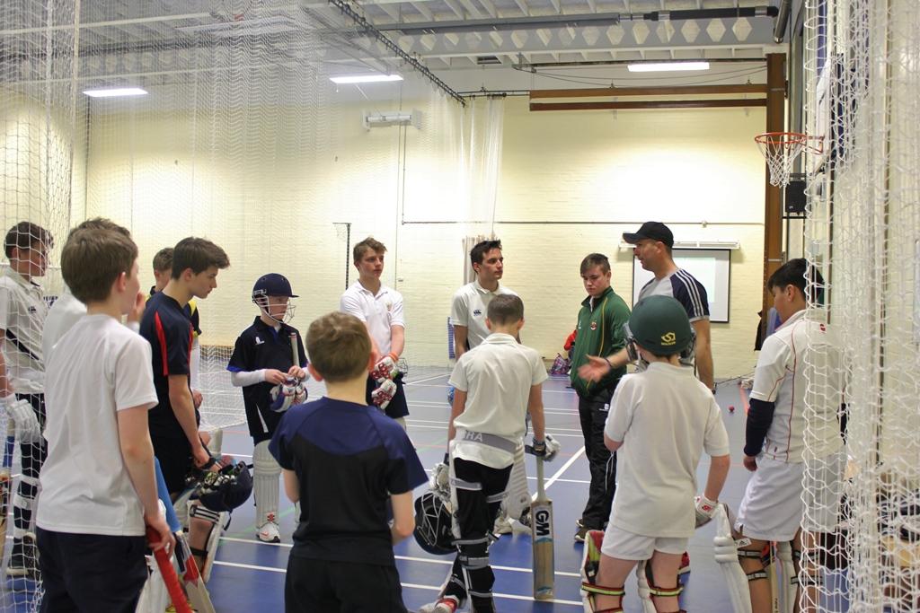 Former england cricket captain Michael Vaughan talks to students at Cheadle Hulme School about batting against spin during the school's cricket masterclass session