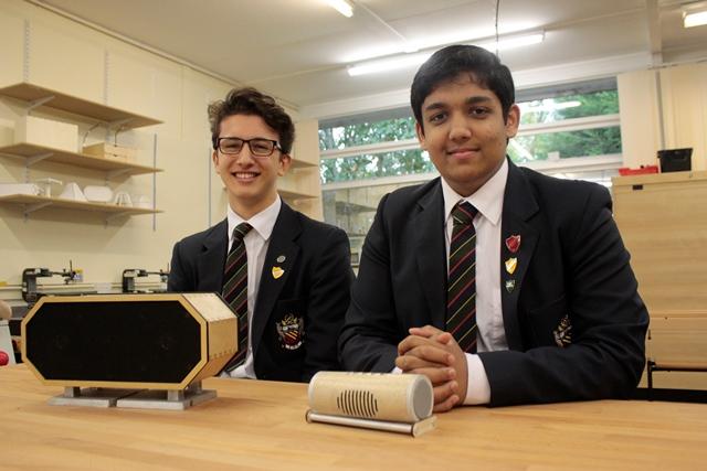 As winners of the arkwright scholarship prize lower sixth form students matthew and hazim sit in their design technology classroom with their GCSE audiotechnology project work on building speakers.