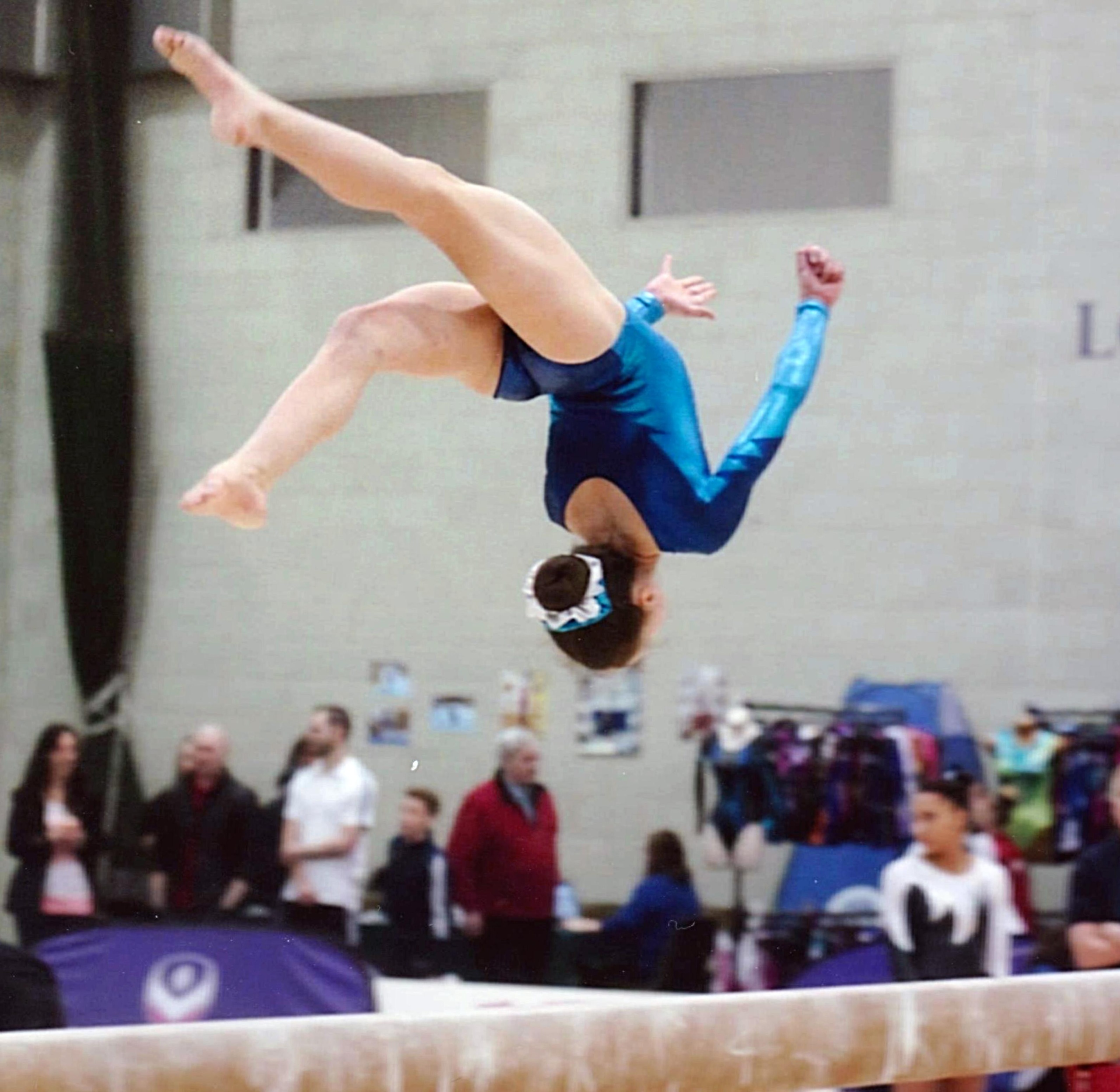 cheadle hulme school student lauren jones performs on the pommel horse during a gymnastic competition as part of the england squad