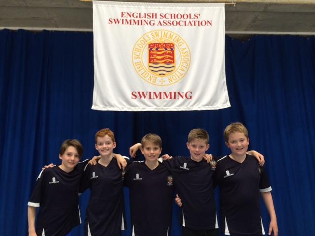 U11s Boys Swimming Team in Sheffield cheadle hulme school's u11 boys swimming team pose under a flat during the english schools swimming association relay championships final at ponds forge sports centre sheffield