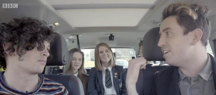 Year 10 students from cheadle hulme school interview their musical idol matt healy from 1975 in the car when they were visited by the singer and BBC Radio 1 Breakfast show DJ Nick Grimshaw as part of the station's School Run video series