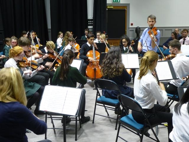 cheadle hulme schools senior strings players take part in a music masterclass with the Manchester String Quartet and conductor Tim Crooks